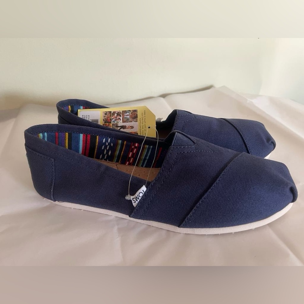Toms Navy Canvas Slip-On Flats with Multicolor Stripe Lining